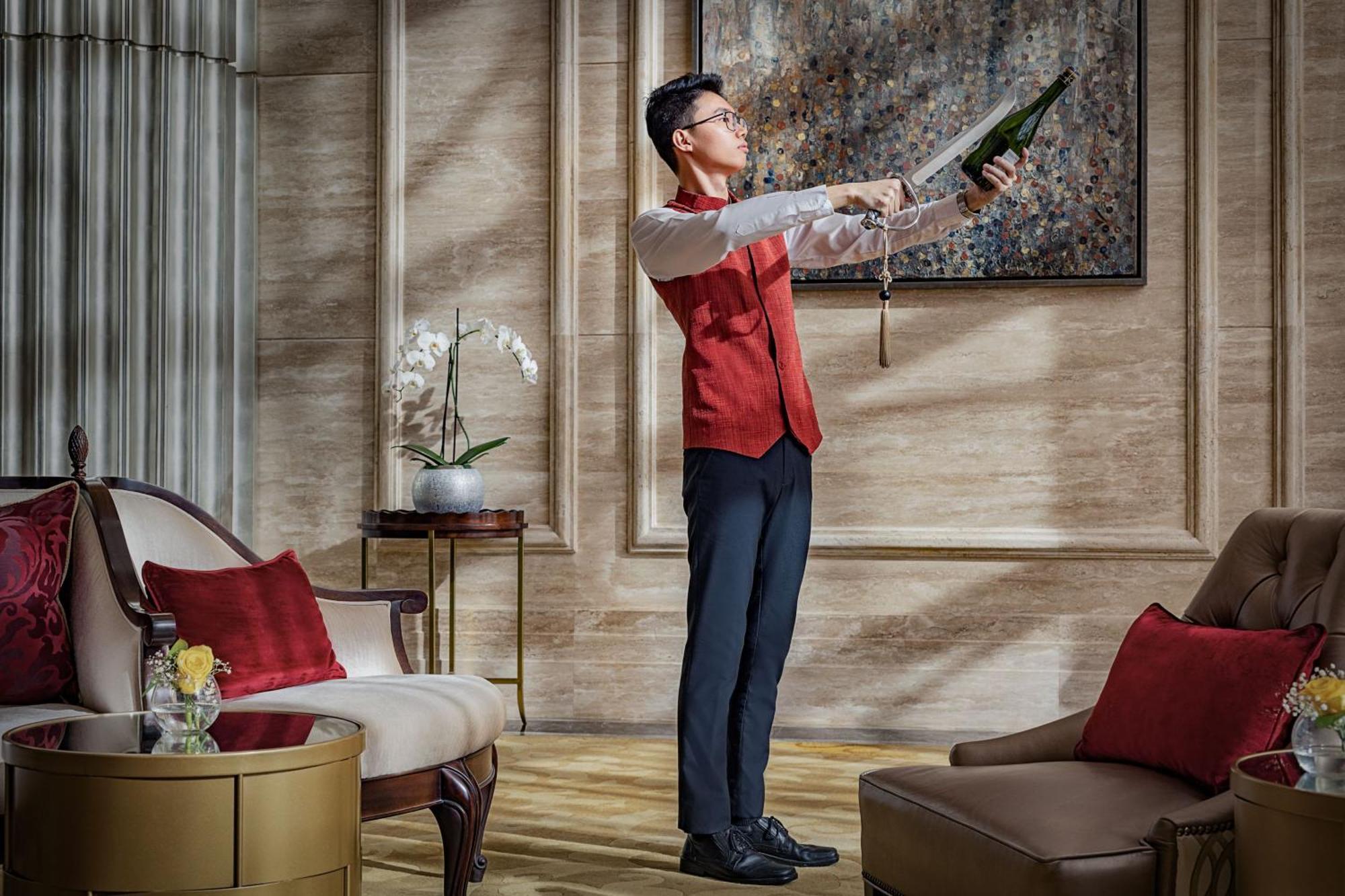 The St. Regis Abu Dhabi Hotel Exterior photo A butler at The Ritz-Carlton, Hong Kong