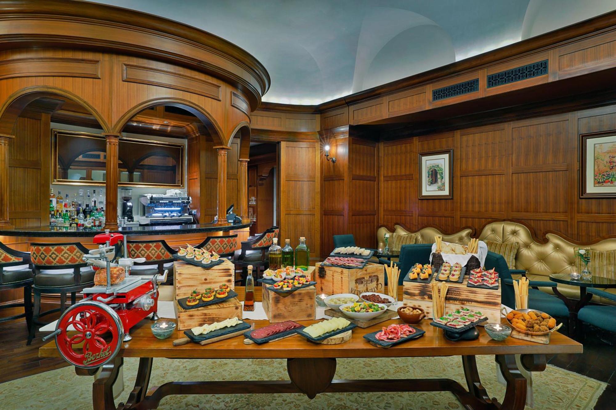 The St. Regis Abu Dhabi Hotel Exterior photo A buffet at a hotel
