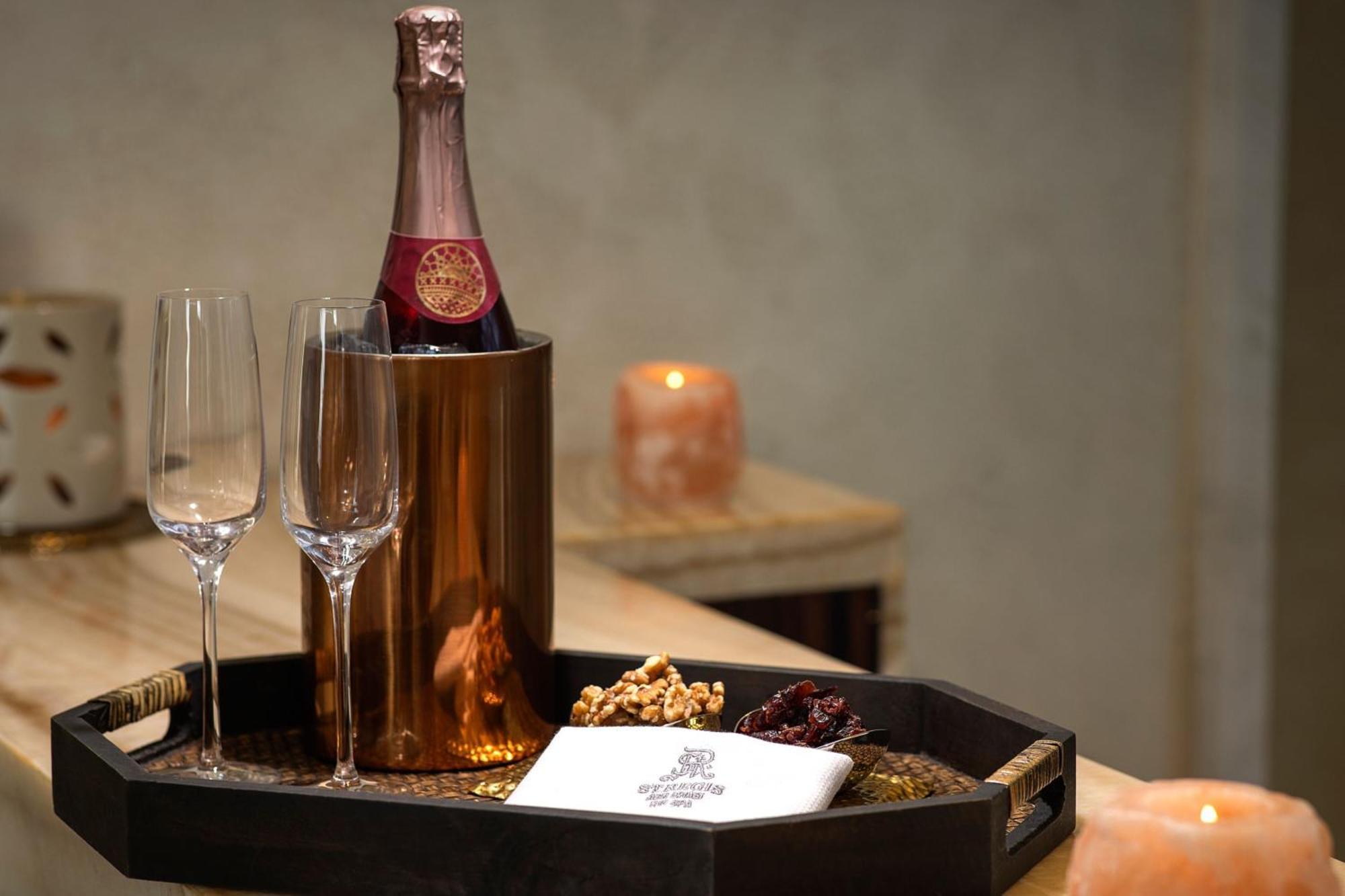 The St. Regis Abu Dhabi Hotel Exterior photo A bottle of champagne