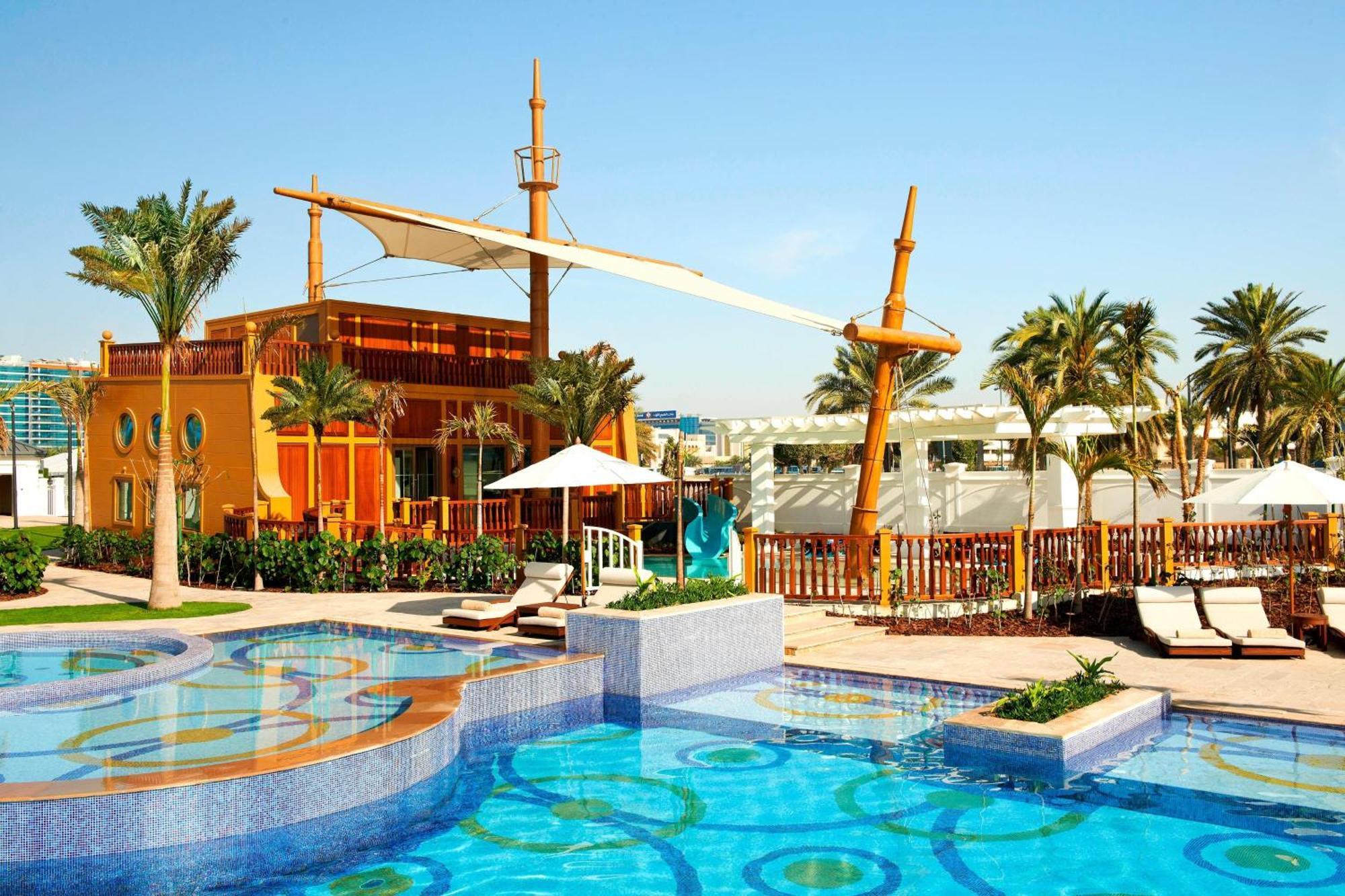 The St. Regis Abu Dhabi Hotel Exterior photo The swimming pool at the resort